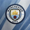 jersey Manchester City bleu ciel avec écusson du club à domicile