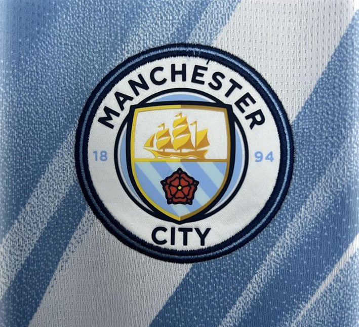 jersey Manchester City bleu ciel avec écusson du club à domicile
