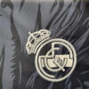 tunique-de-supporter-real-madrid-design-dragon-rouge-sur-fond-noir-collection-2024-2025 Tunique de supporter Real Madrid design dragon rouge sur fond noir collection 2024 2025
