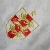 maillotangleterrecommablanclogo.jpg Maillot Concept Angleterre Édition Comma Blanc 2024 vue de profil