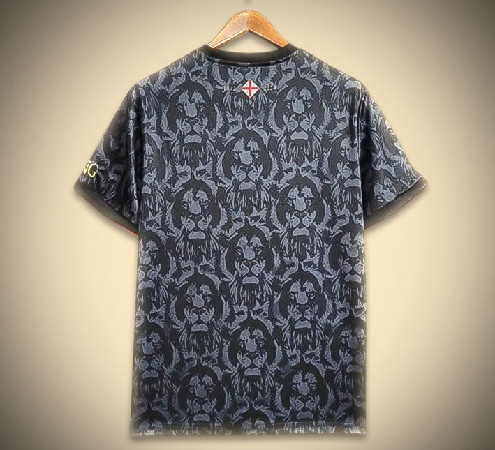 maillotangleterrecommanoirdos.jpg Maillot Concept Angleterre Édition Comma Noir 2024 vue de dos