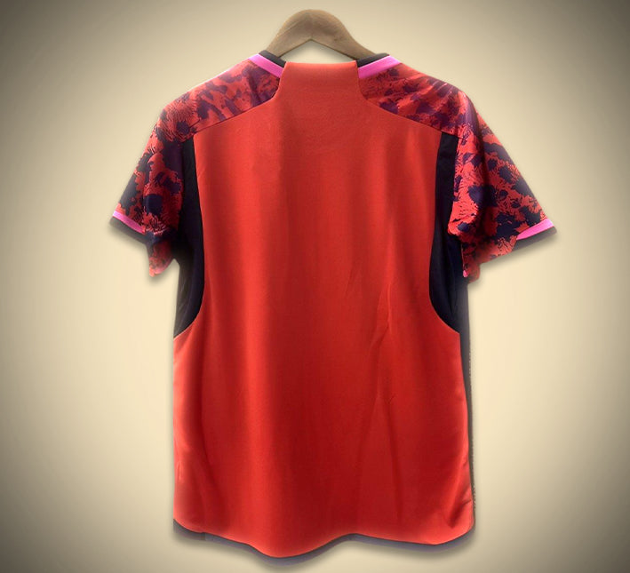 maillotespagnefleursdos.jpg Maillot Concept Espagne Édition Rouge 2024 vue de profil