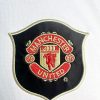 tenue de football Manchester United rouge modèle extérieur vintage