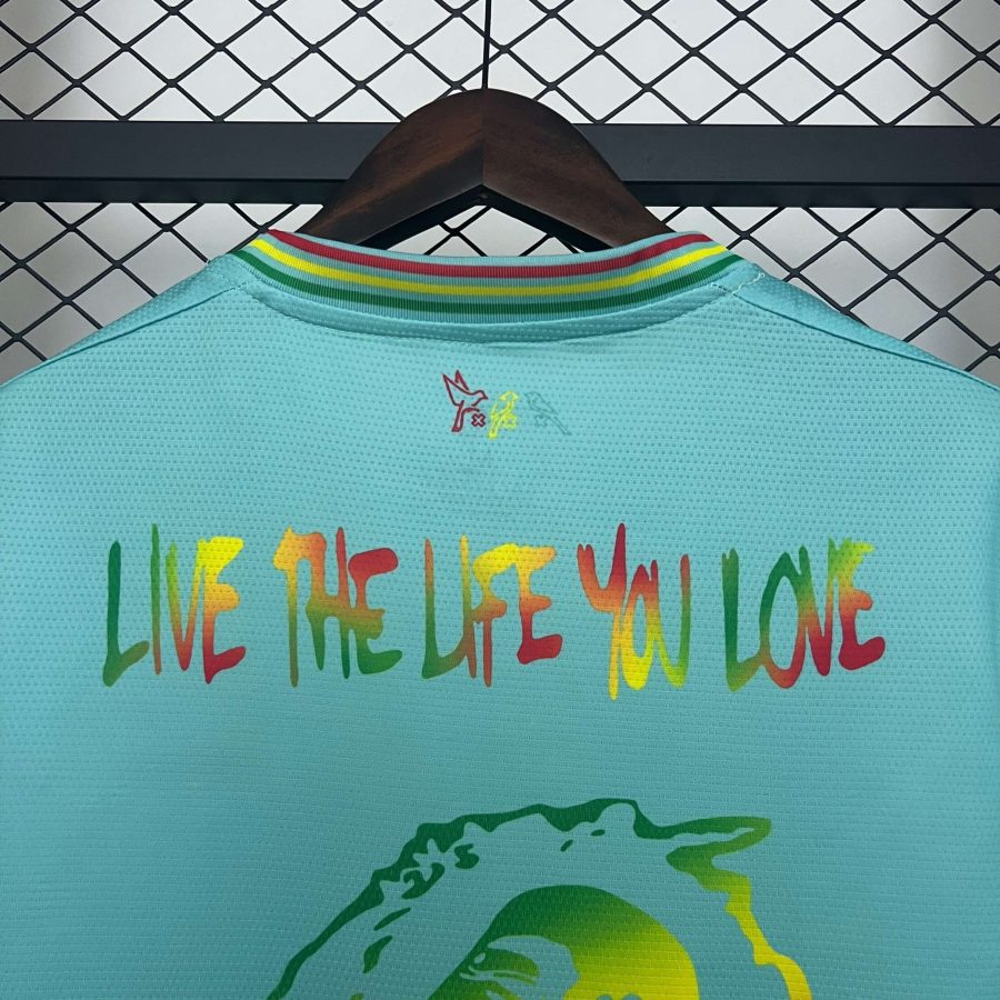 tshirt-football-ajax-amsterdam-hommage-bob-marley-tenue-domicile-2025-2026 Tshirt football Ajax Amsterdam hommage Bob Marley tenue domicile 2025 2026