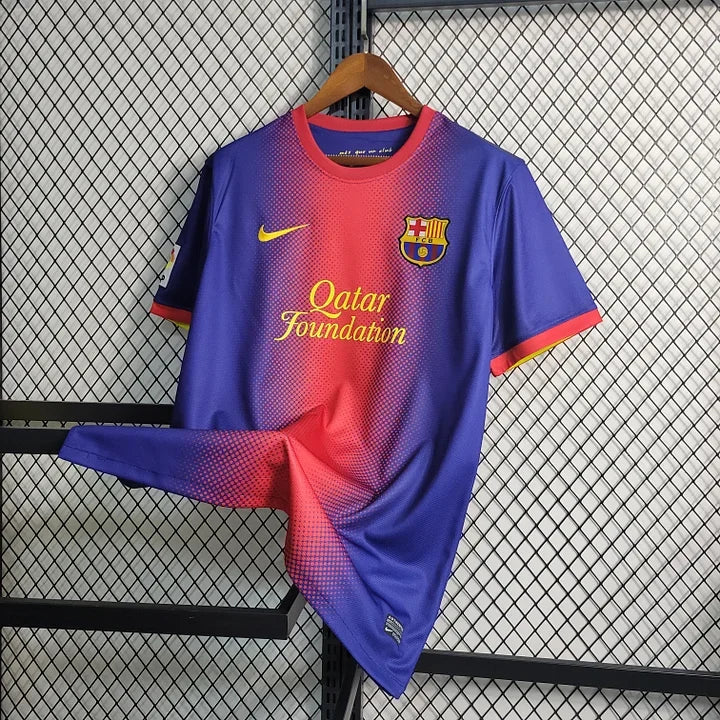38d8bac4c4b9278f9541ac325ee50514.jpg Maillot FC Barcelone Rétro 2012/13