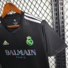 7FBB41CC1B27FB57A1EF7D4B8C7B6D2F_540x_f17aed9f-47b7-4596-a39c-a25c190fce10.jpg Maillot Real Madrid 2023-2024 Noir Balmain