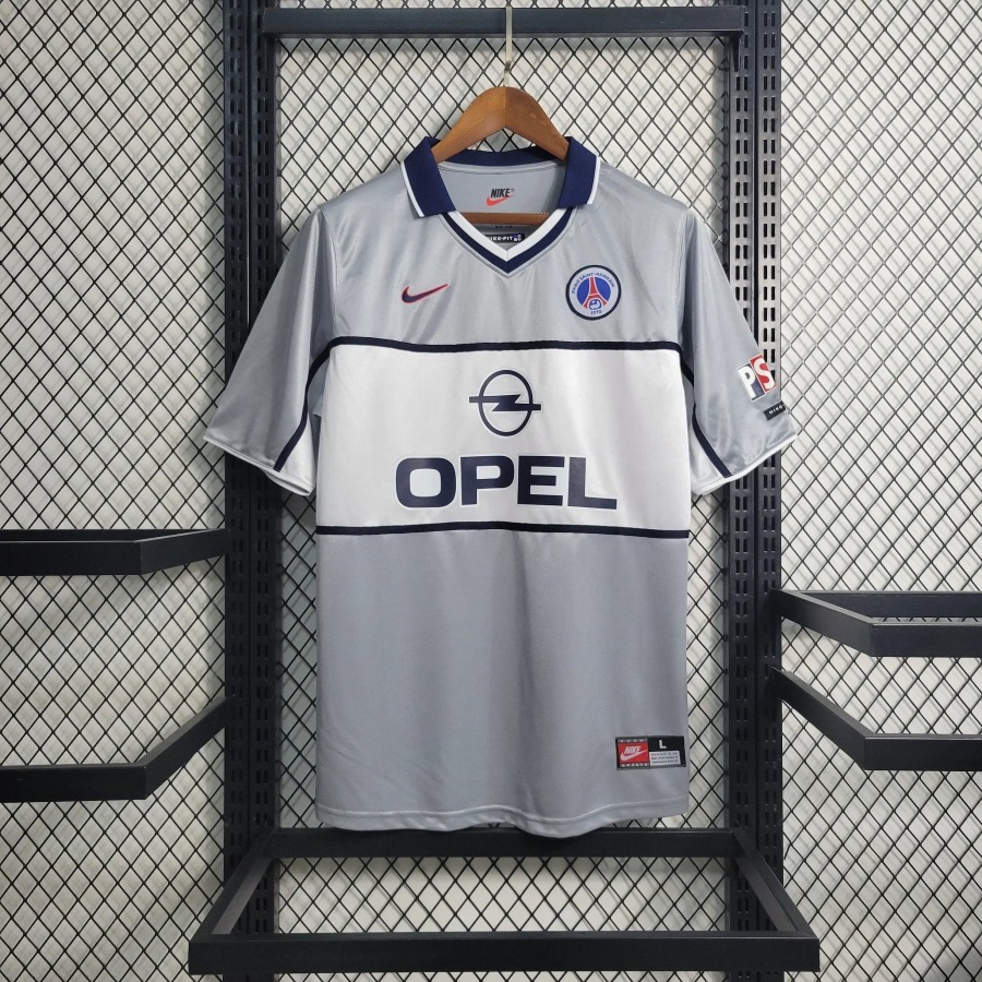 8d537cc9873fdc6e783a9c443250629f.jpg Maillot Paris Retro 2000